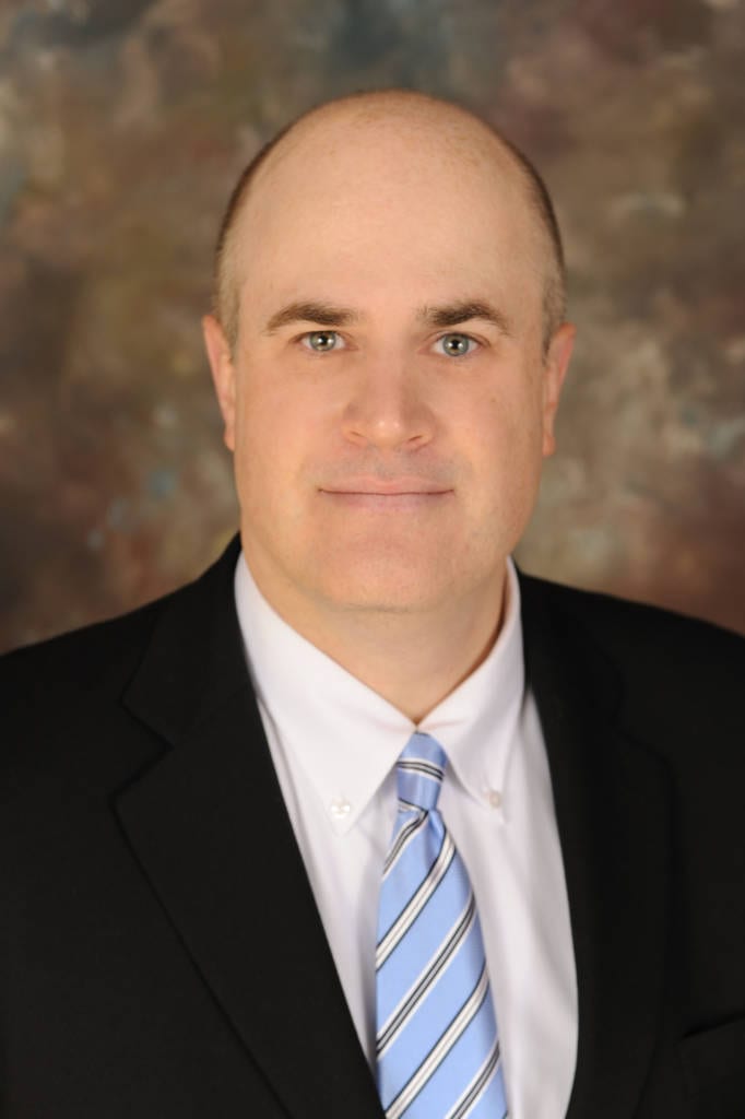 Dr. Charles Clayton